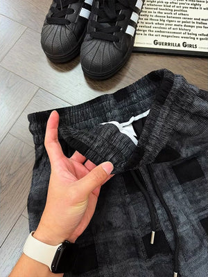 wide-leg pants in charcoal with plaid and drawstring waist