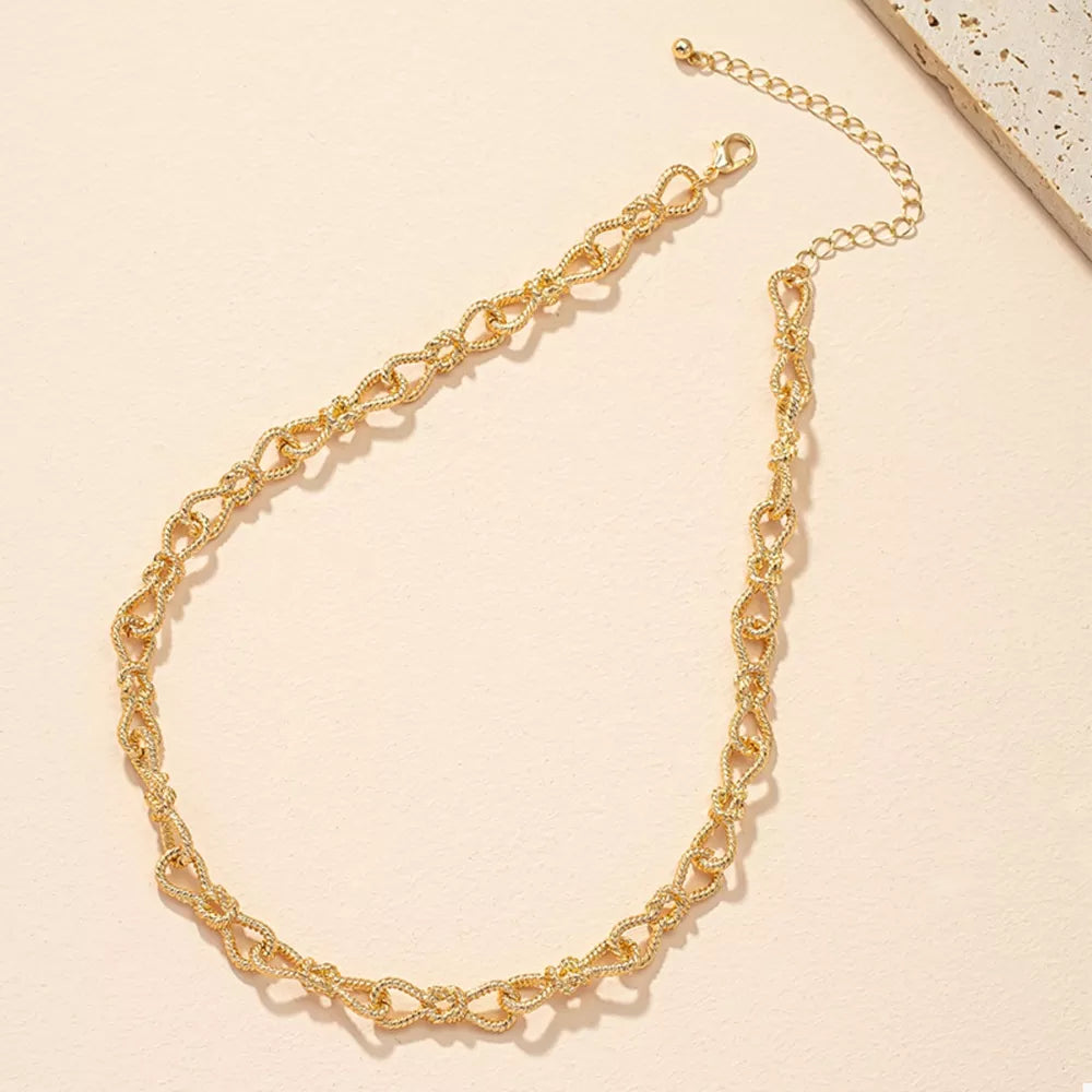 necklace in gold featuring adjustable length and chain fit