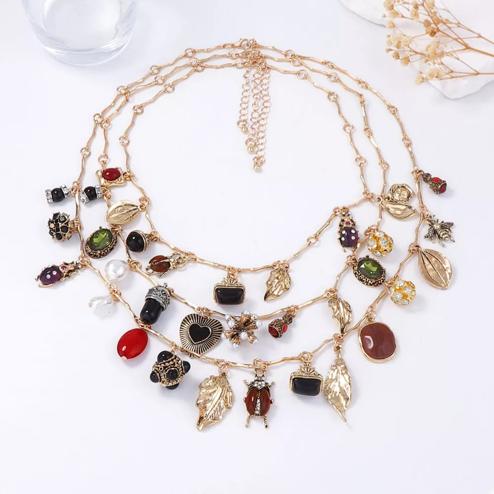 necklace in gold featuring layered and regular fit