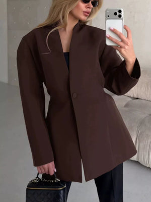 white A-line blazer with deep v-neck