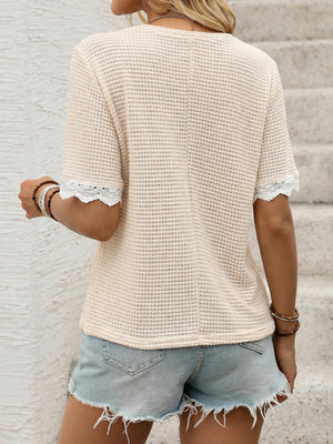 Apricot waffle knit maternity tee with lace trim on sleeves.