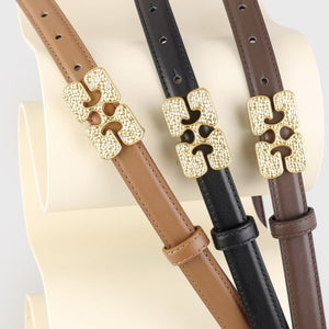 Textured buckle cowhide leather belts in brown, coffee brown, and black with gold hardware.