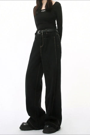 Dark wash denim jeans with stitched edges and a straight-leg cut.