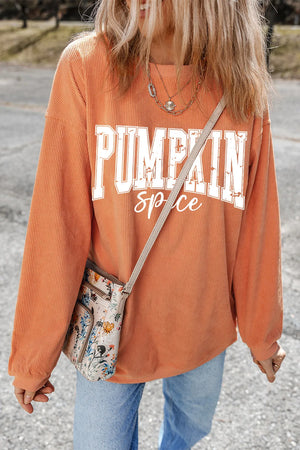 Textured corduroy sweatshirt in sherbet orange with "Pumpkin Spice" graphic, crewneck, long sleeves.
