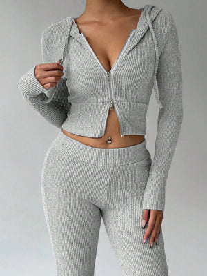 100% polyester Care instructions: Machine wash cold lounge set in Light Gray with fitted top, flared pants silhouette