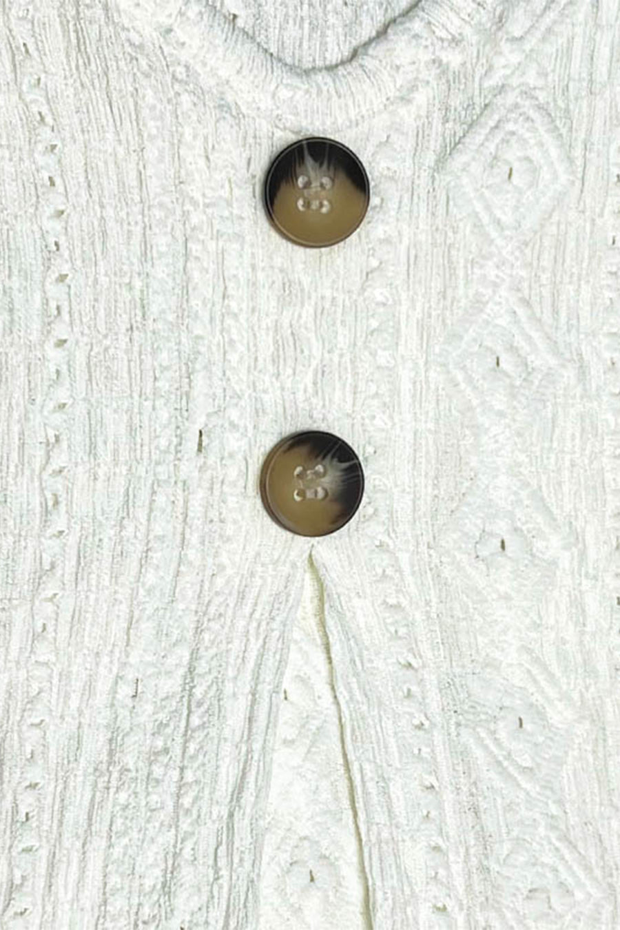White textured diamond-stitch button-down blouse with tortoise buttons