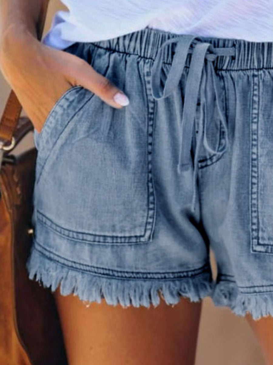denim shorts in Dark Blue with raw hem and mini