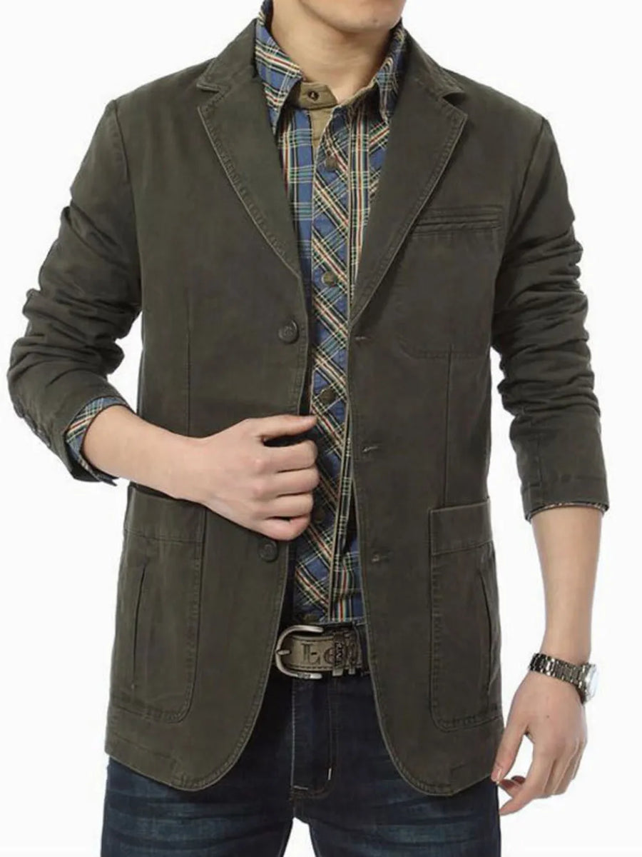 Military green cotton blazer with lapel collar, buttoned front, and patch pockets.