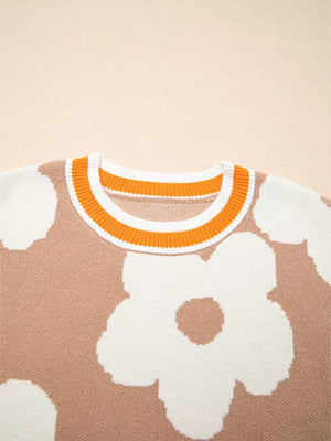 Tan floral pattern sweater with orange and white striped crew neck.