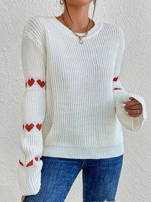 Black Apricot pullover sweater featuring ribbed and heart