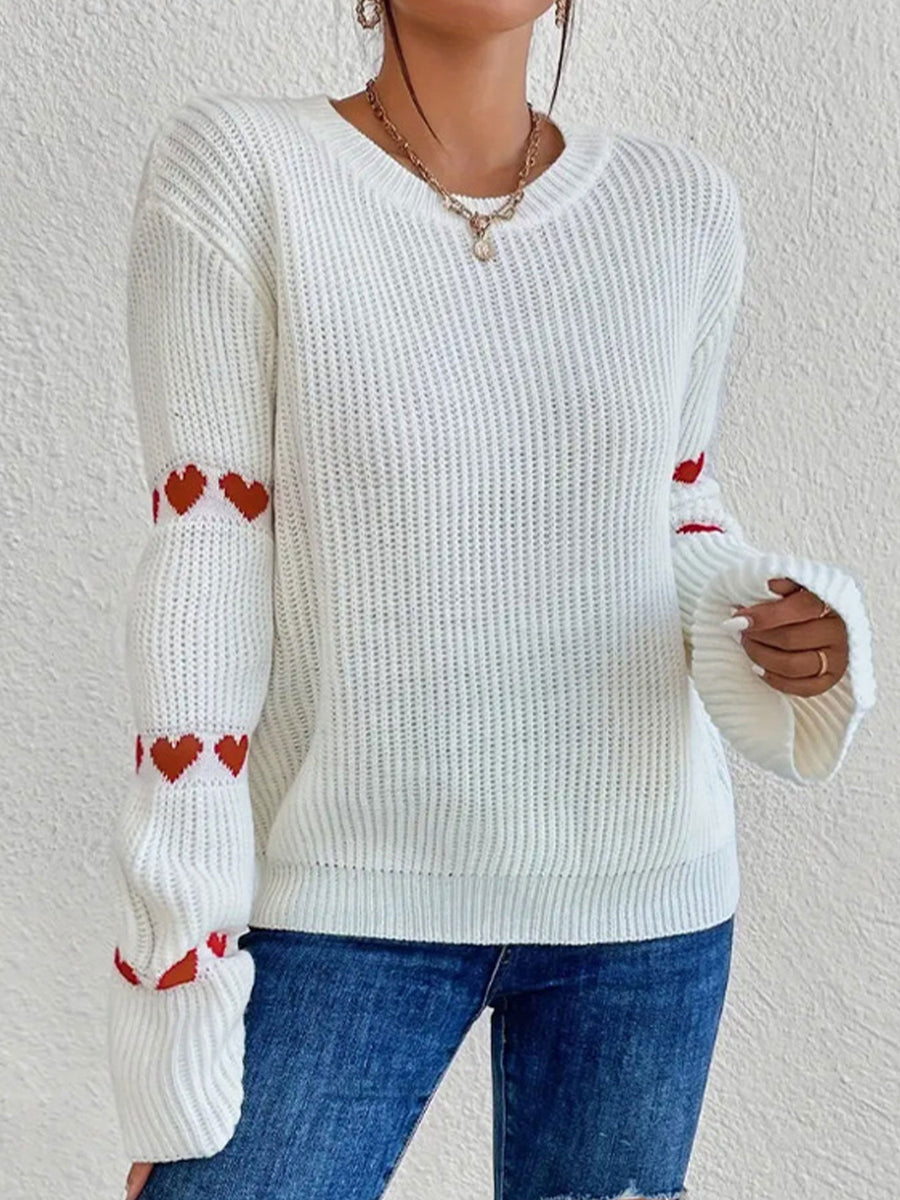 Black Apricot pullover sweater featuring ribbed and heart