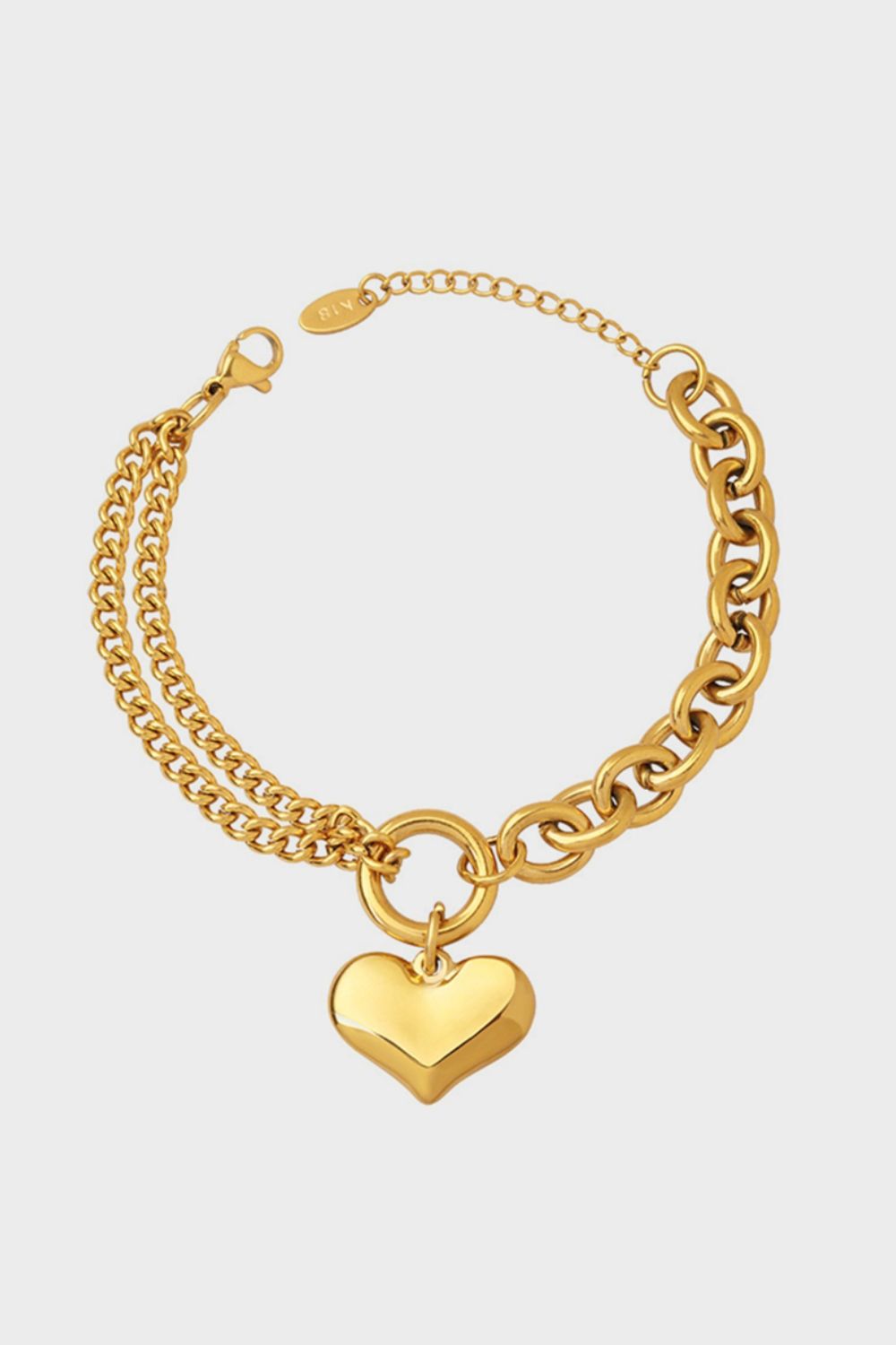 Gold chain bracelet with a heart charm and two chain styles