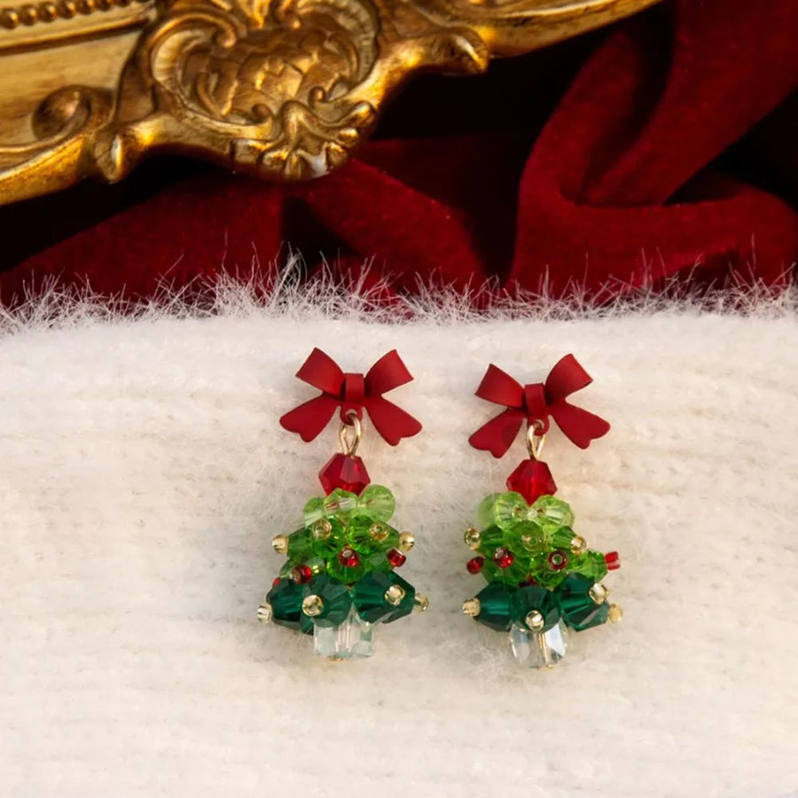 forest green earrings featuring dangle and Christmas tree motif