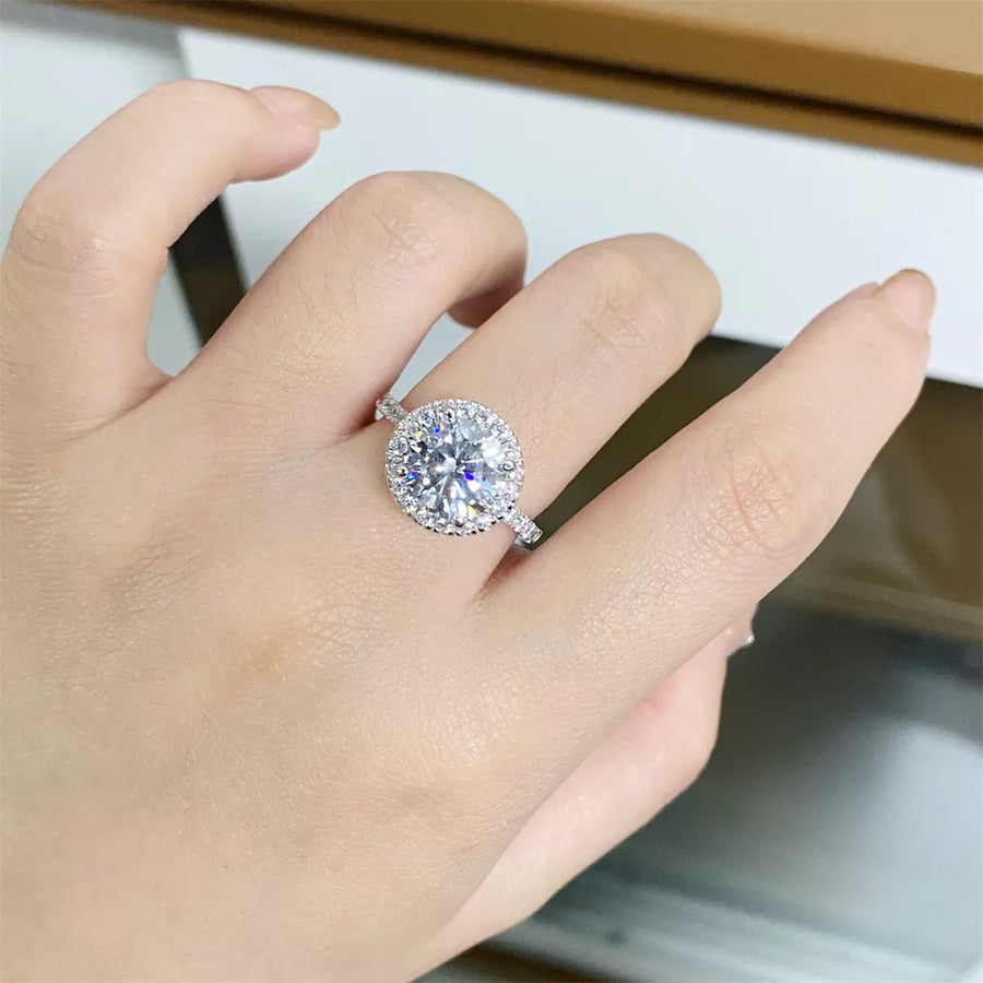 925 sterling silver,Moissanite Carat weight: 5CT Care instructions: Avoid wearin ring in Silver with round silhouette