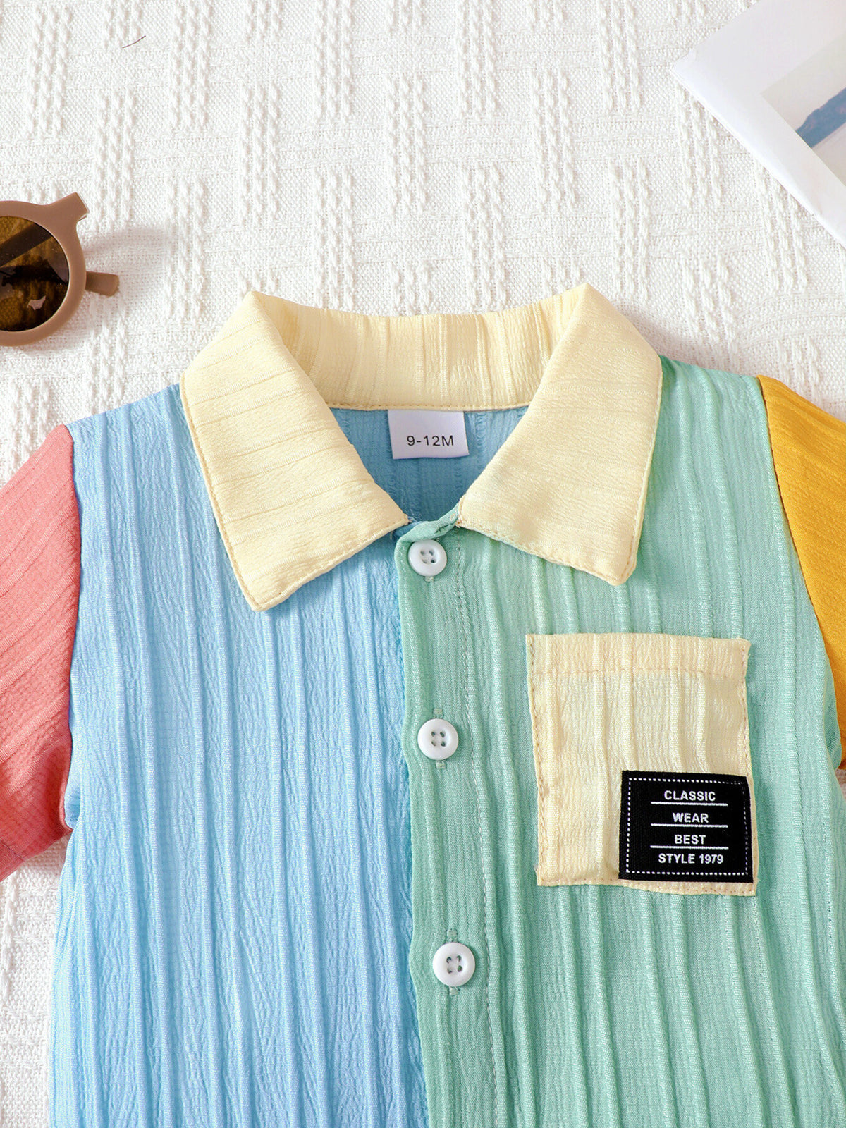 Baby color block button-down romper with yellow collar and chest pocket