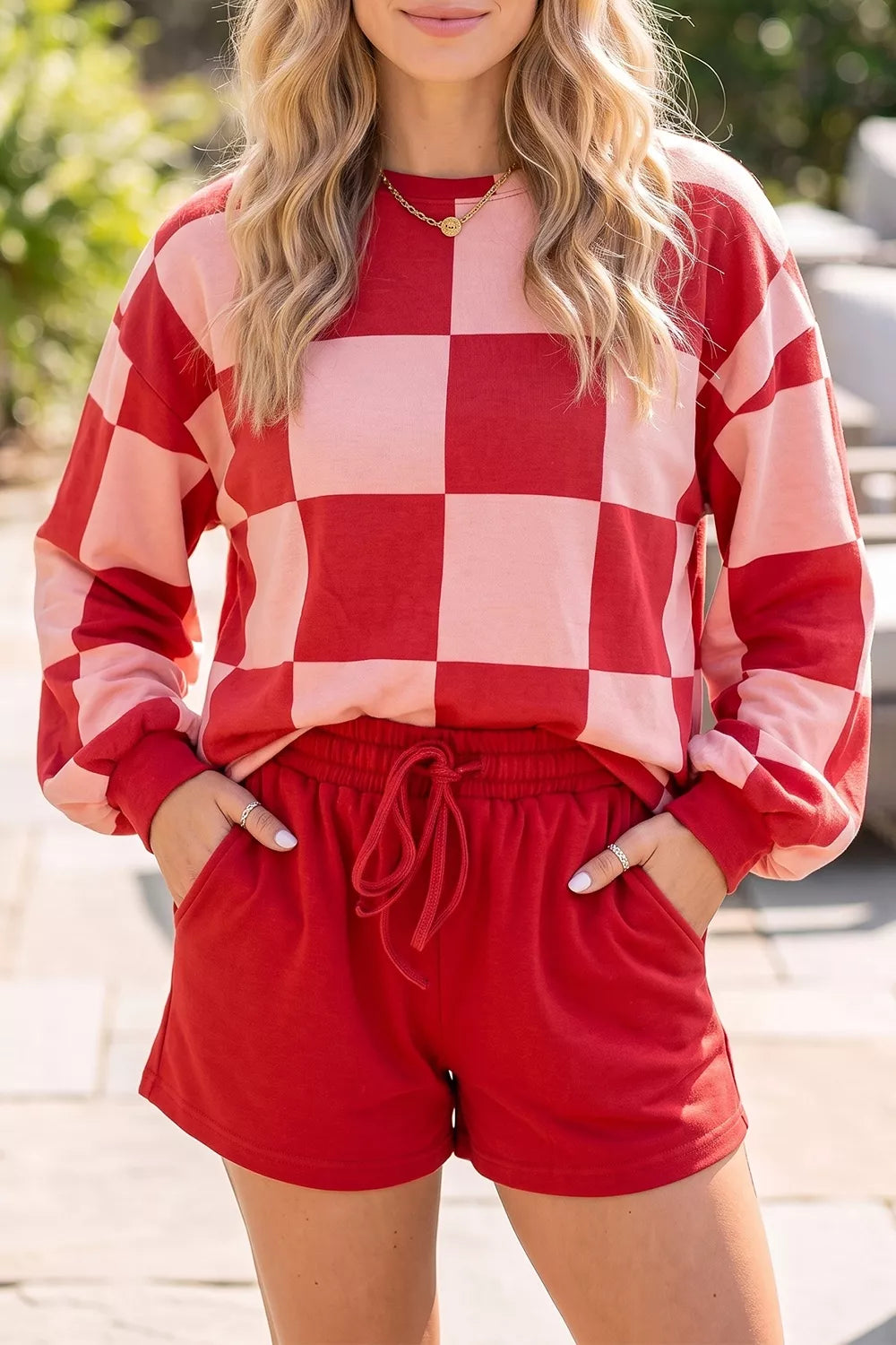 light pink pajama set featuring drawstring and checked