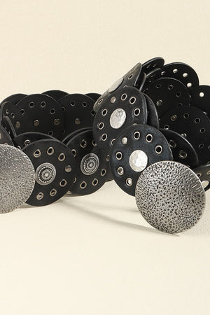 Black faux leather belt with round disc embellishments and silver hardware.