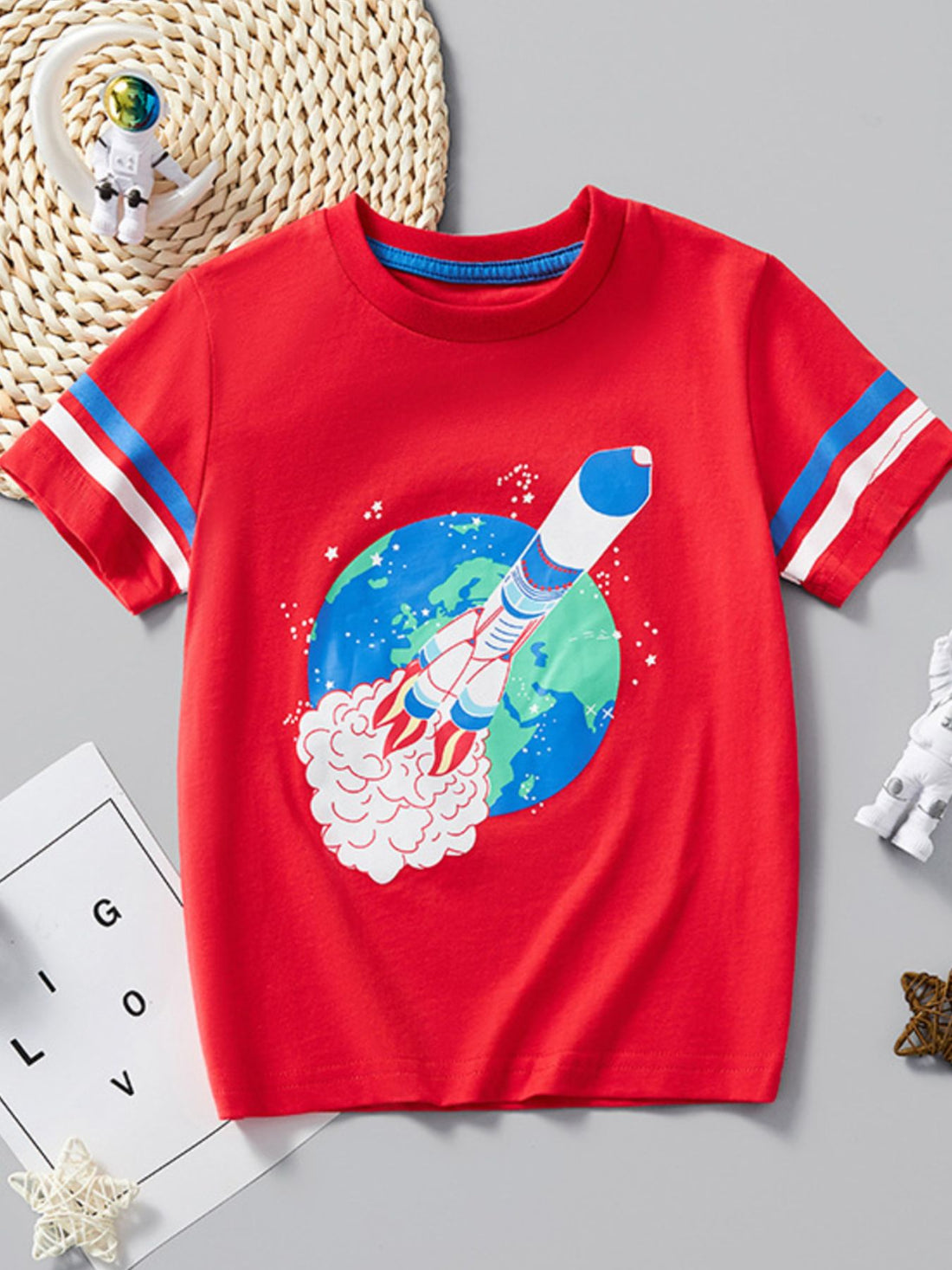 Red cotton t-shirt with rocket launch graphic and striped sleeves