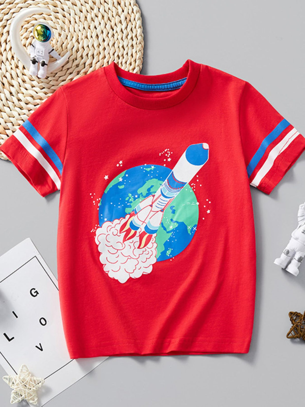 Red cotton t-shirt with rocket launch graphic and striped sleeves