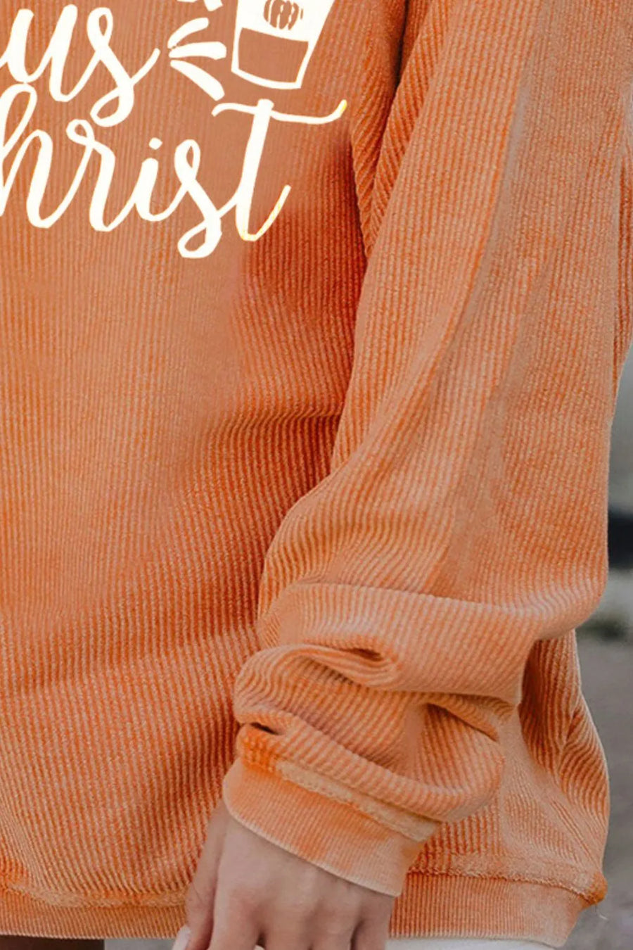 Textured corded sherbet oversized graphic sweatshirt with cuffed sleeves.