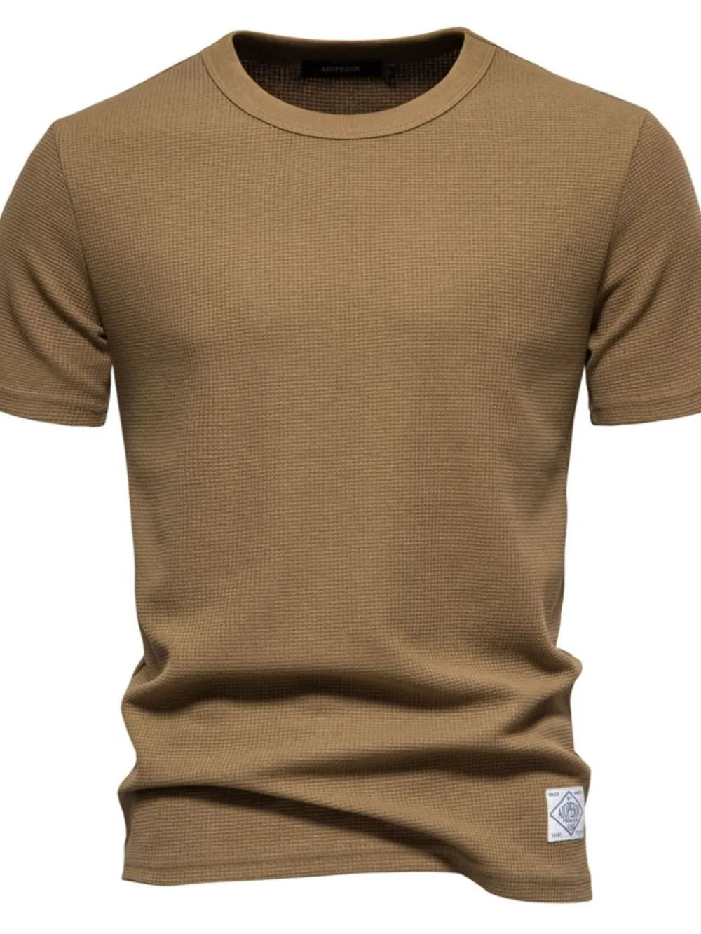 Textured crew-neck t-shirt in Caramel waffle knit with short sleeves and a small logo patch.
