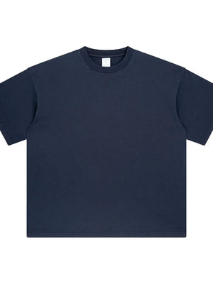 Oversized washed cotton crewneck t-shirt in navy blue with crew neckline and short sleeves.