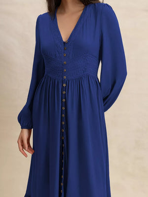 Blue viscose maxi dress with V-neck, lace trim, button front, and long sleeves.