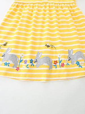 Yellow striped cotton toddler dress with embroidered bunnies and flowers detail.
