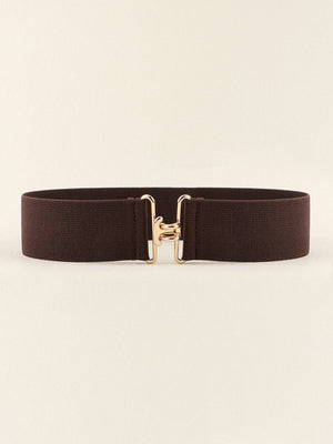 Chocolate elastic belt with sculpted gold buckle