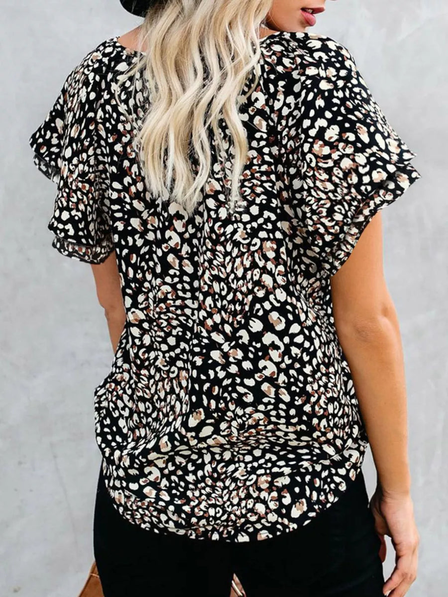 Black leopard print blouse with flutter sleeves and V-neck detail.
