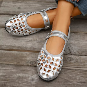 black flats with buckle and floral