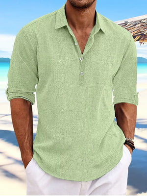 Light green cotton half-button casual shirt with rolled sleeves.