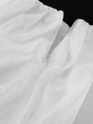 White sheer fabric dress with a zipper detail