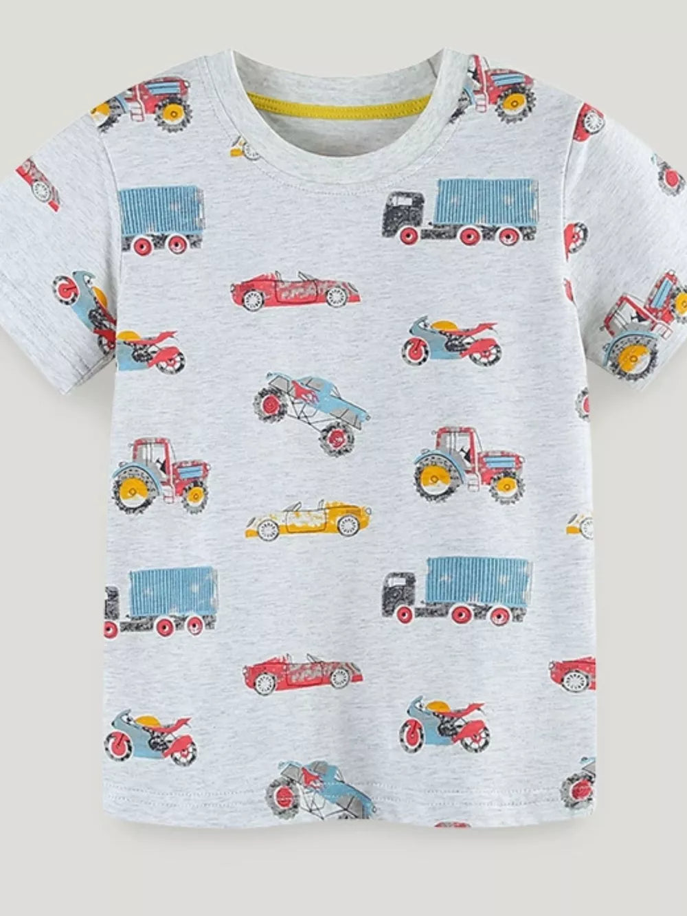 Toddler grey cotton t-shirt with a playful vehicle print including trucks, cars, tractors, and motorcycles.