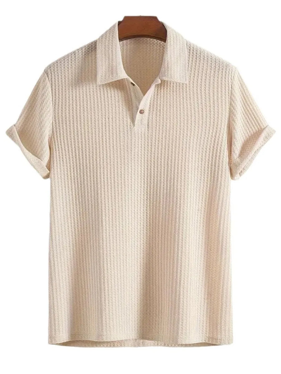 Beige textured polo shirt with rolled sleeves and button neckline