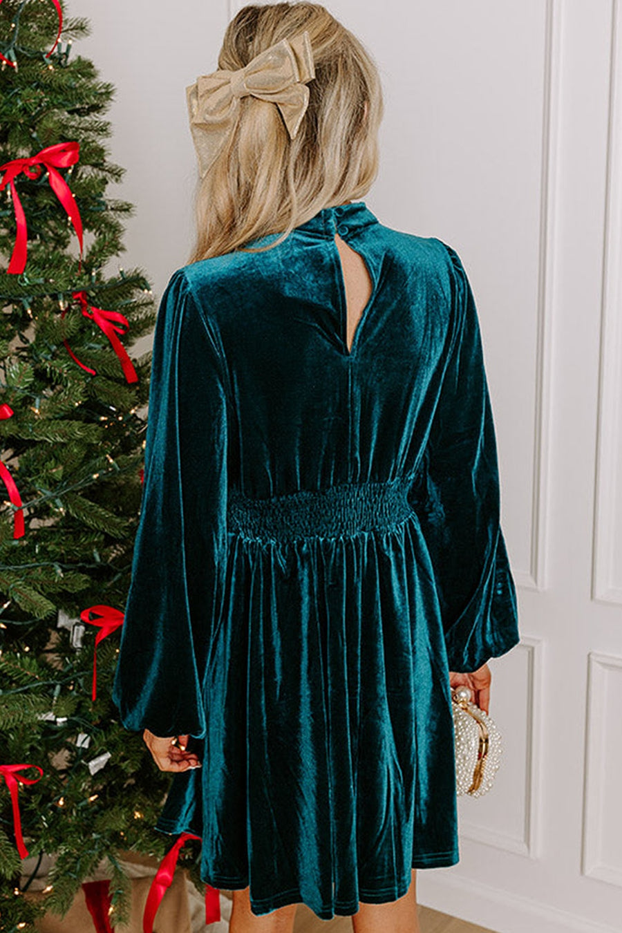 95% polyester, 5% elastane Care instructions: Machine wash cold mini dress in emerald green with A-line silhouette