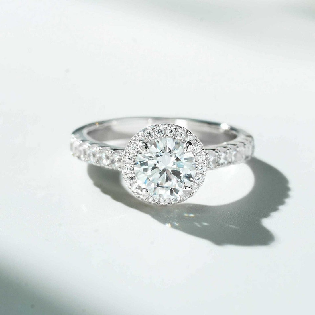 Halo Pave 1 Carat 925 Sterling Silver Moissanite Ring in silver with halo setting