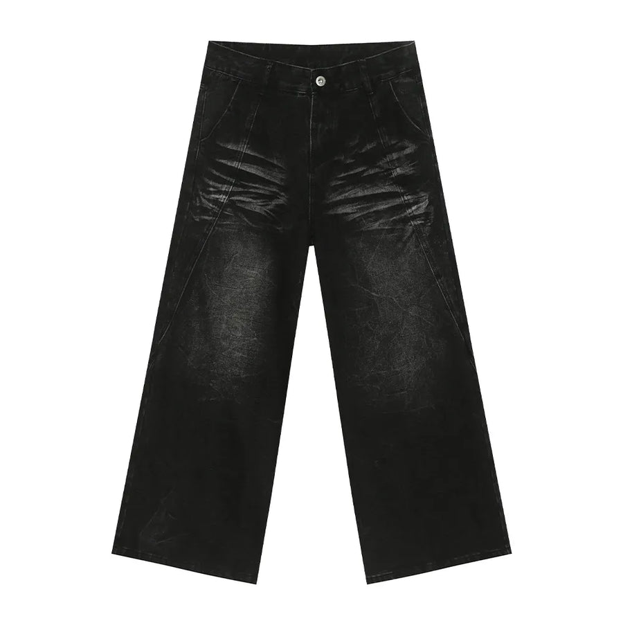 Faded black denim palazzo trousers with a wide leg and distressed detailing.