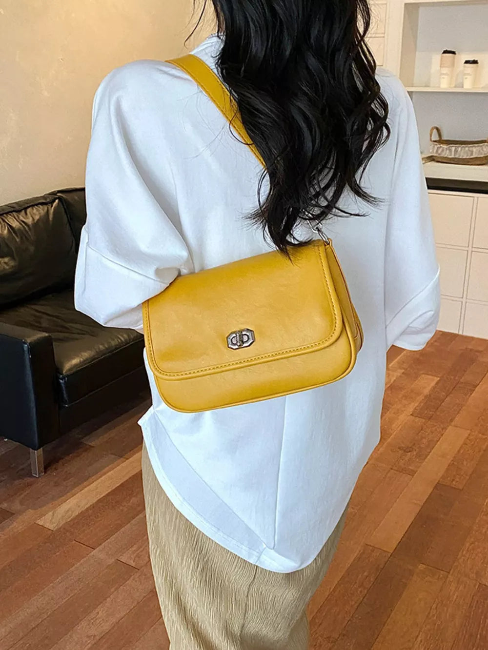 Twist Lock Flap Shoulder Bag in Brown with flap closure
