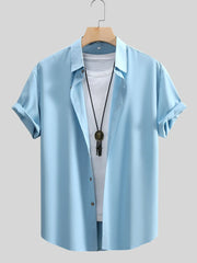 button-up shirt in sky blue featuring buttoned and regular fit