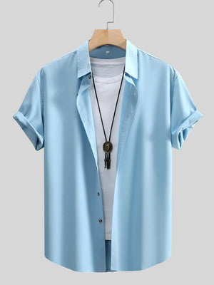 button-up shirt in sky blue featuring buttoned and regular fit