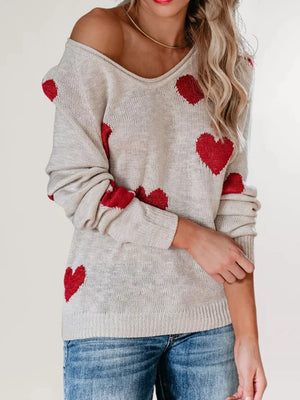 red pullover sweater featuring ribbed and heart-print