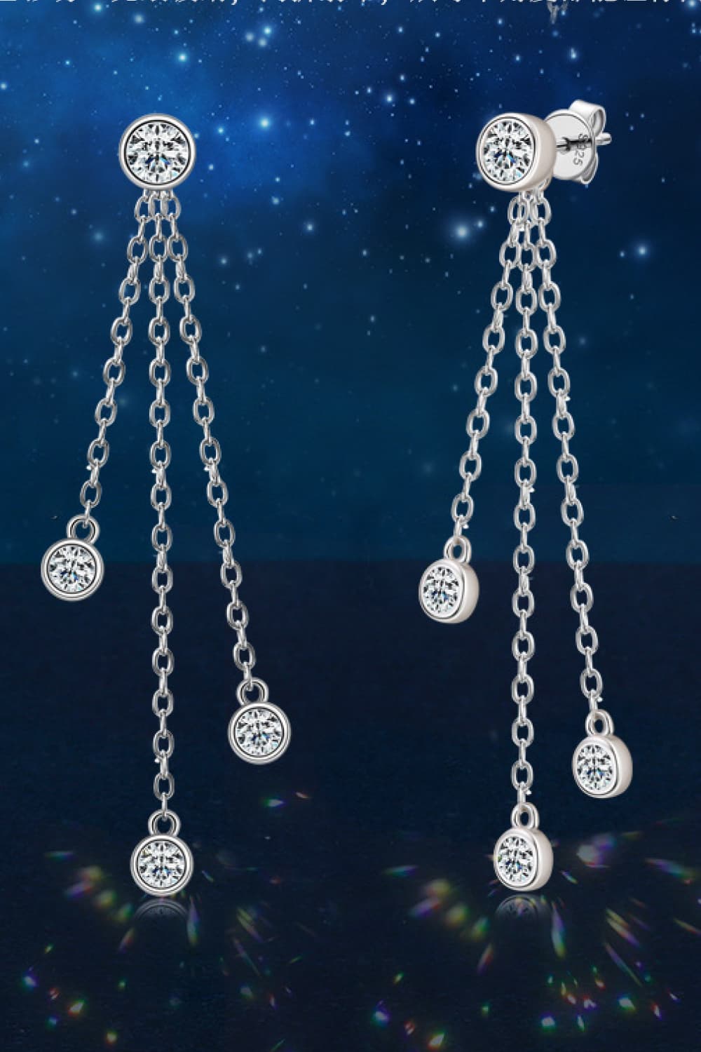 Silver cascading chain earrings with crystal accents.