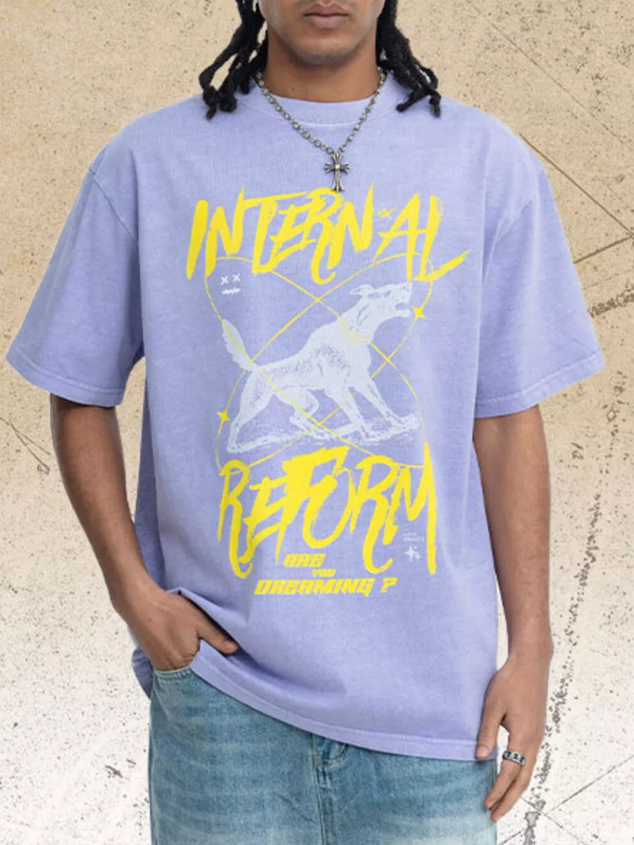 Men's light purple cotton graphic t-shirt with howling wolf and text.