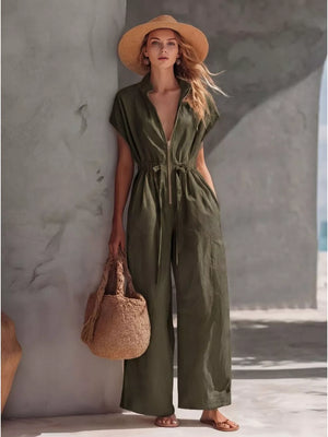 Army green wide-leg jumpsuit with zipper front, drawstring waist, and short sleeves.