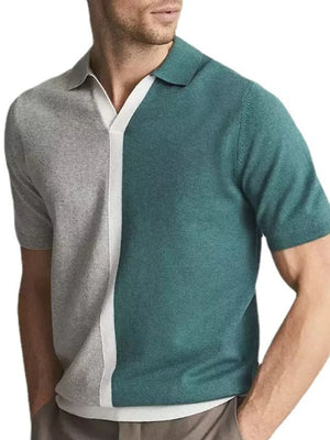 Colorblock polo shirt in dark green and grey with white contrast placket.