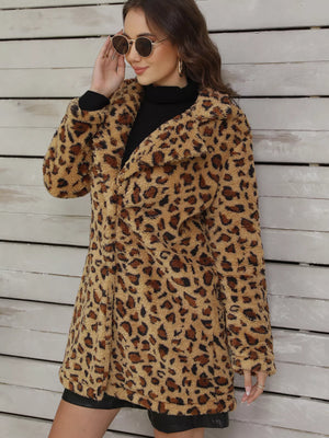 Cozy fuzzy teddy wrap coat in leopard print with a shawl collar.