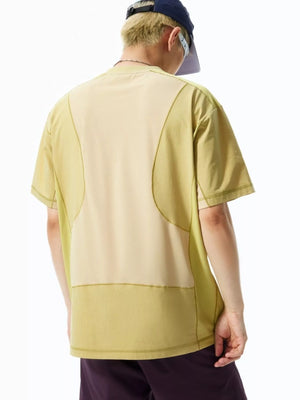 Relaxed fit t-shirt in light green with contrast stitching and paneling detail.