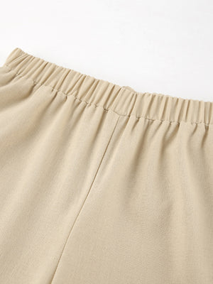Tan cotton wide-leg pants with elastic waistband detail