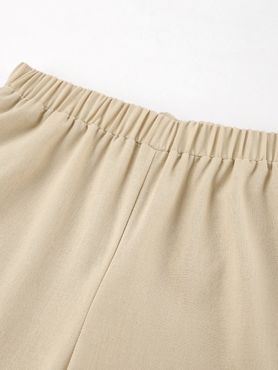 Tan cotton wide-leg pants with elastic waistband detail